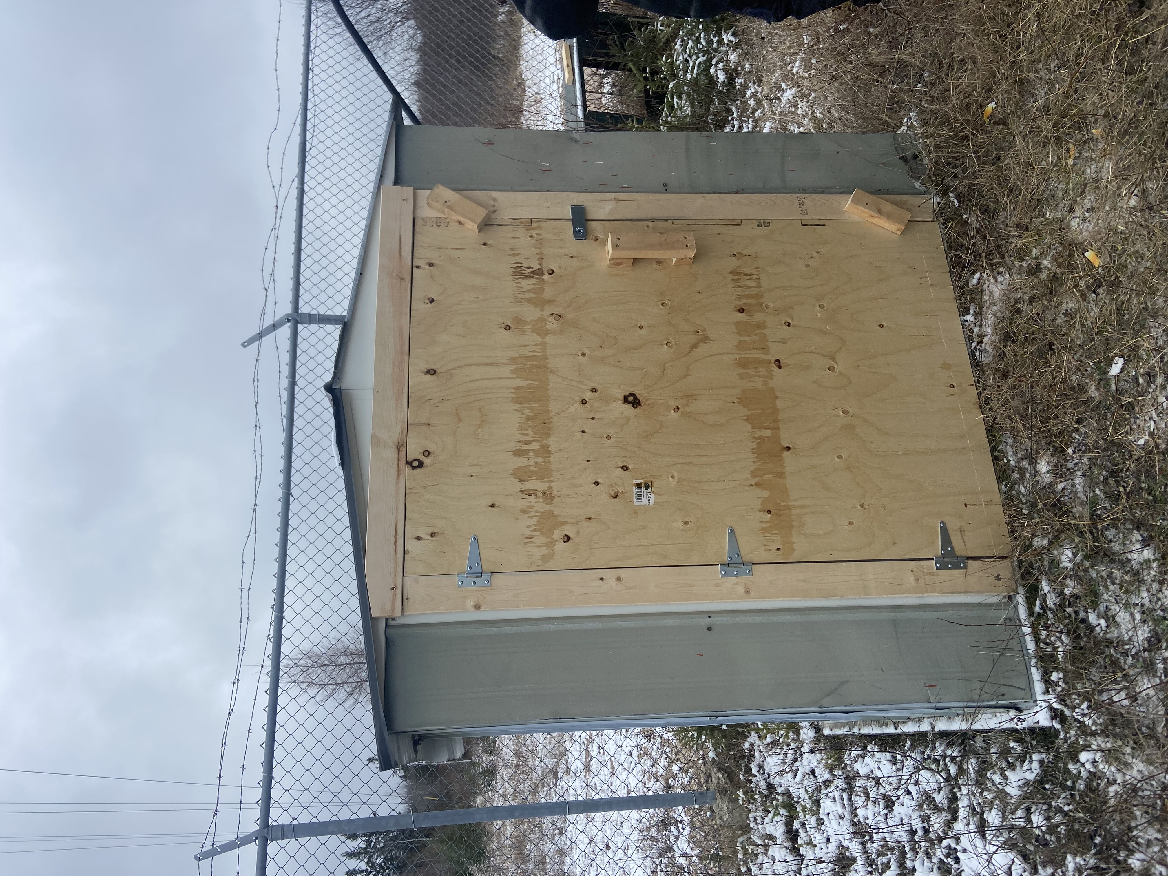 Reinforced plywood door at Hadashville site